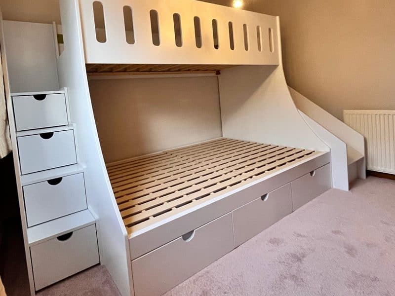 single over double bunk beds with slide and stairs close view