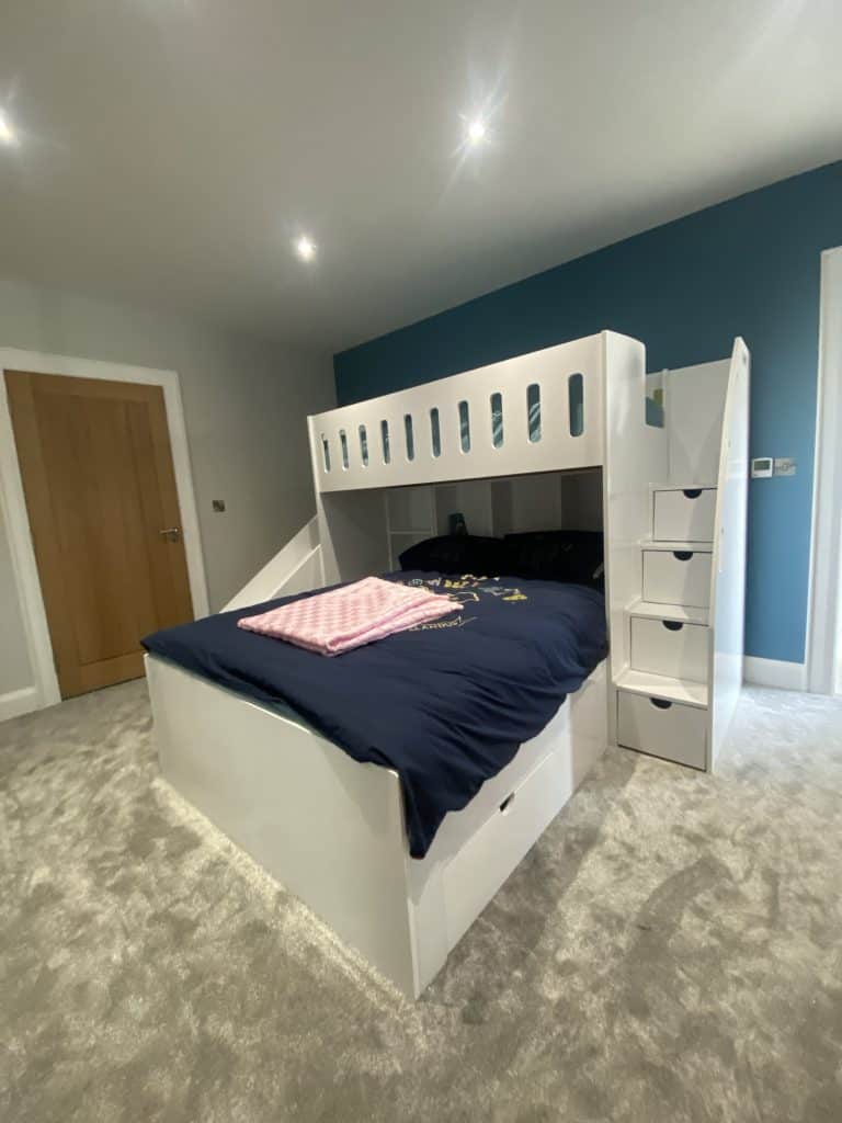 L-shaped double bed and single bed bunk with slide