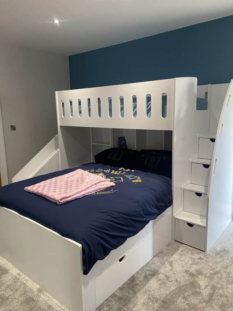 L-shaped double and single bunk bed with wide stairs