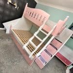 Children’s single bunk beds with stairs and shelves