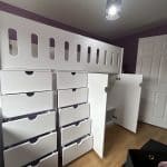 White Cabin Bed with Storage and Oval Cutouts