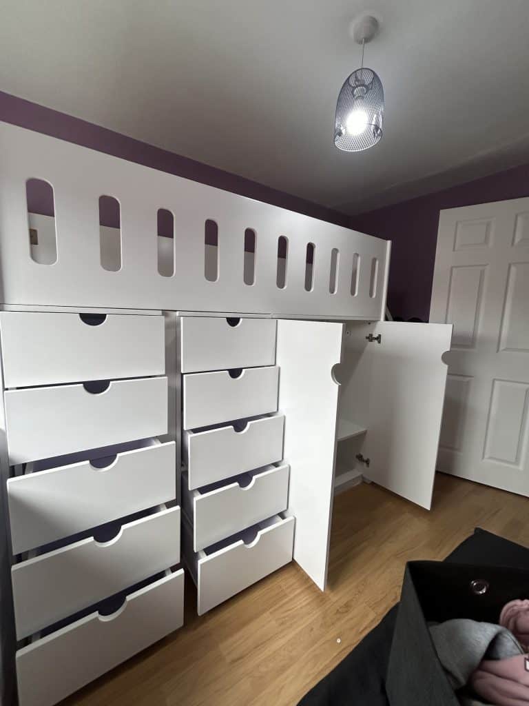 White Cabin Bed with Storage and Oval Cutouts